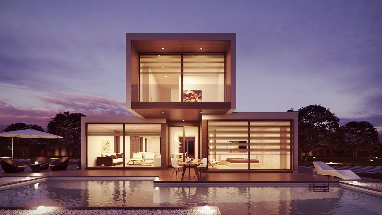 Akşam aydınlatmasıyla iki katlı villa ve havuz — RE Mimarlık
